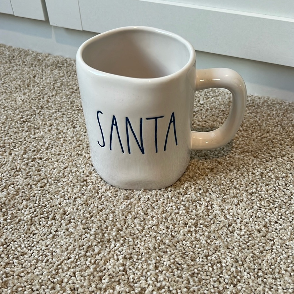 White Santa mug with blue text Rae dunn